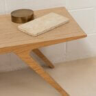 Detail photograph of Adler coffee table in natural stained finish.