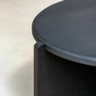 Detail photo of the Klee coffee table in black stained finish.