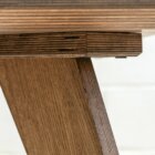 Detail photo of the Schlemmer coffee table in dark stained finish.