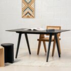 Photograph of Wright desk and Kandinsky stools in black and natural stained finish.